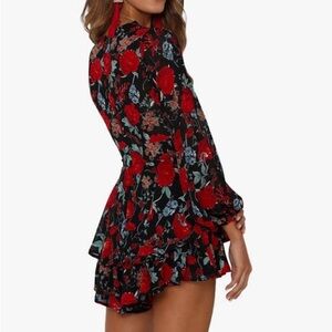 Woman’s floral romper v neck tie waist
